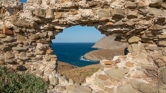 Seascape from Kalekoy framed by the ancient Kalekoy castle window- turkish aegean island Gokceada (Imbros) Canakkale, Turkey