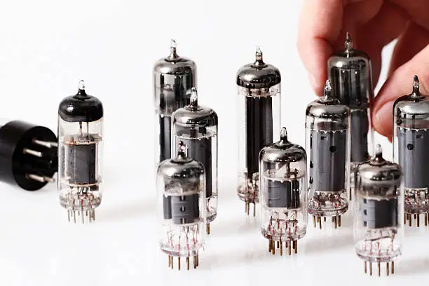 Glass vacuum radio tubes.  Isolated image on white background