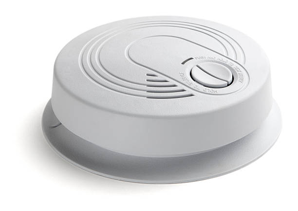 Smoke/Carbon Monoxide detector Smoke detector isolated on a white background smoke detector photos stock pictures, royalty-free photos & images