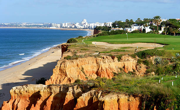 Golf course by the sea Algarve golf coastal scenario, Portugal algarve stock pictures, royalty-free photos & images
