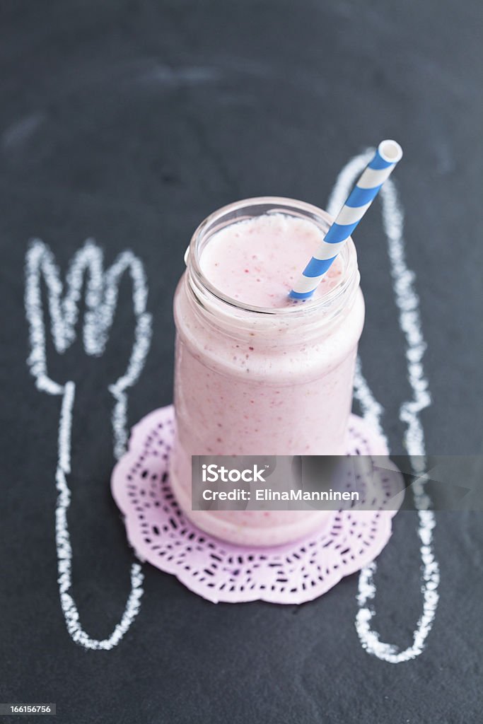 Strawberry smoothie Strawberry smoothie with striped straw with knife and fork chalk drawing Backgrounds Stock Photo