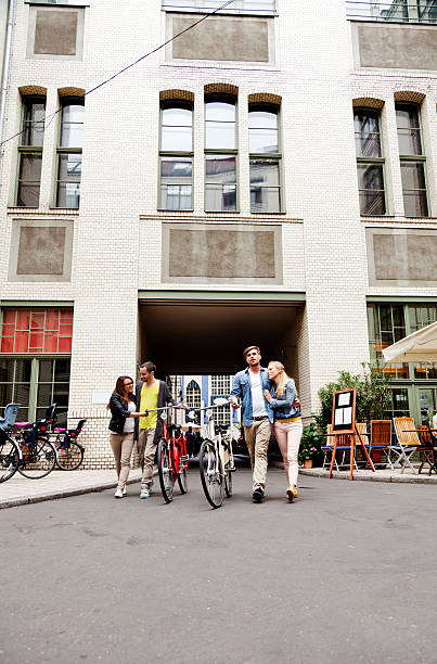 istock Two Young Couples Leisure Alley Walk 166157508