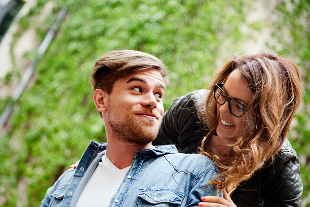 istock Happy Young Couple Hugging 166157902