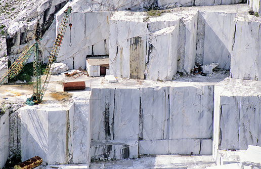 High stone mountain and marble quarries in the Apennines in Tuscany, Carrara Italy. Open marble mining.