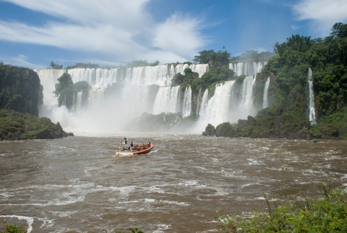 A boat approaching to Iguassu falls (Iguazu/Iguacu), Misiones, Argentina.