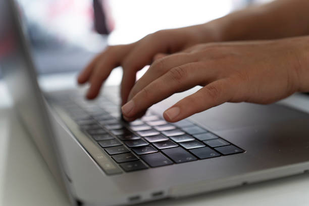 istock A woman using a smartphone and a laptop. 1661622710