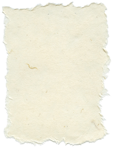 Texture of creamy white rice paper with torn edges. Isolated on white background.