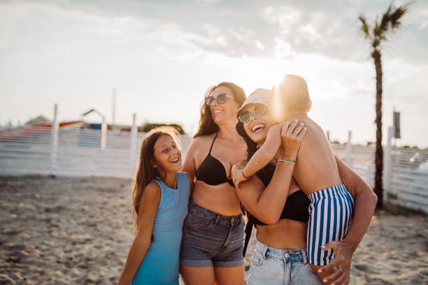 istock Family at the beach 1661666266