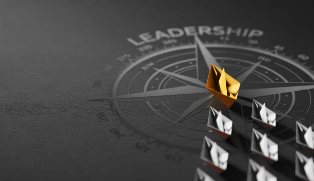 istock Leadership concept, yellow leader boat leading whites on compass 1661678519