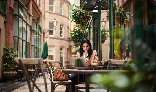 young businesswoman stops for a coffee