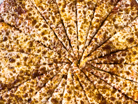 Full frame Cheese pizza slices from above