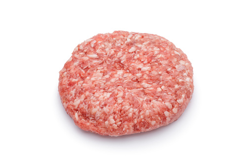Two pieces of raw minced beef meat (for burgers), isolated on white background