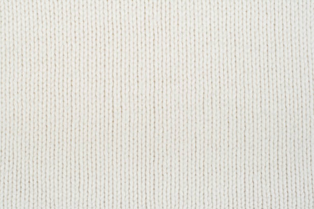 istock Sweater or scarf fabric texture large knitting. Knitted jersey background with a relief pattern. Wool hand- machine, handmade. 1661750304