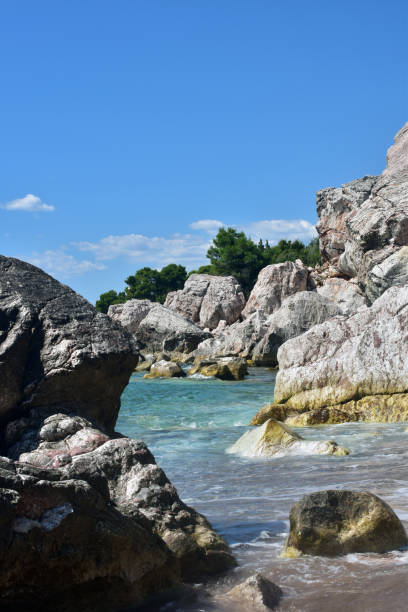 istock Rocks on the beach on a sunny day. 1661765856