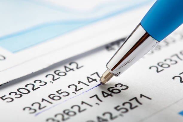 istock Checking the value of securities. Pen, share listing and checking financial chart. Concept of banking, financial report and financial audit. 1661799843
