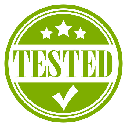 Tested and approved green vector stamp on white background