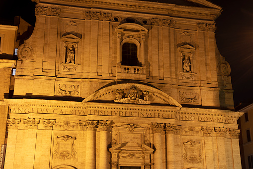Parrocchia di Santa Maria in Vallicella, from the streets of historic rome, italy - night