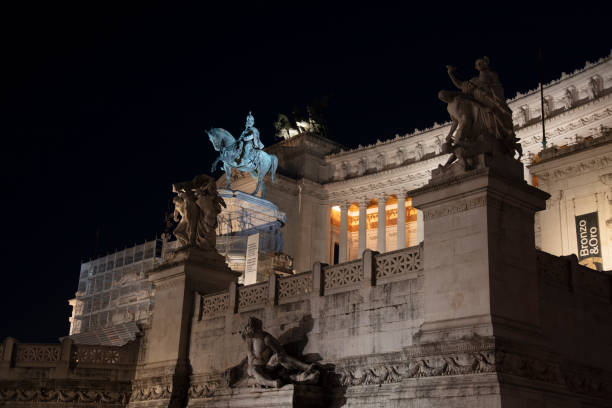 istock Sculptures on Altare della Patria - night 1661809600