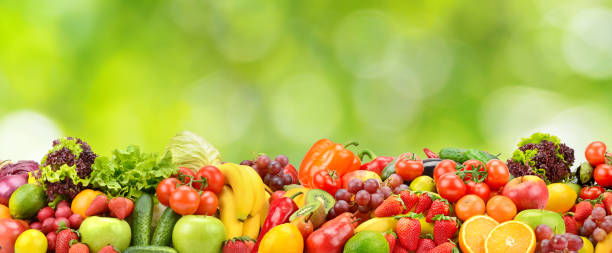 istock Collage fresh colored vegetables, fruits, berries on green background. 1661812434