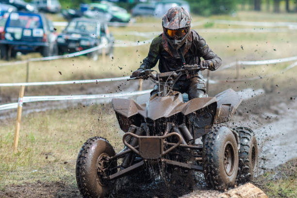A motocross rider's adventure on a sunlit trail