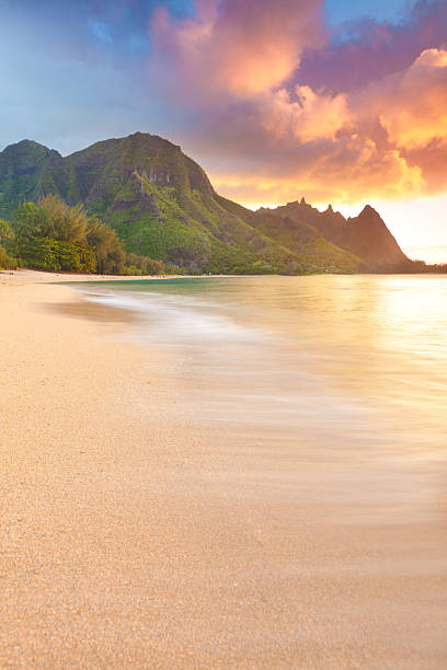 sunset on the north shore of kauai-tunnels beach, hawaii stock photo