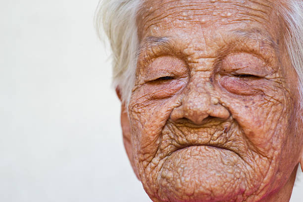 istock old woman happy , 166185712