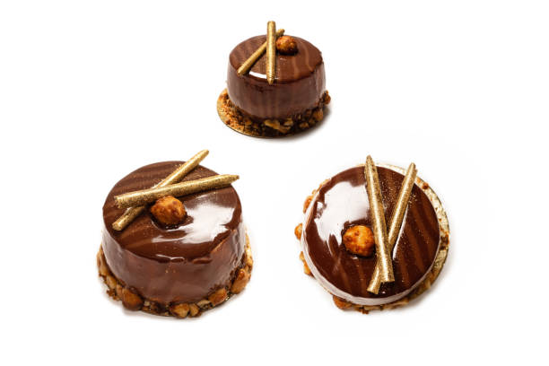 istock Chocolate and caramel cake isolated on a white background. 1661857132