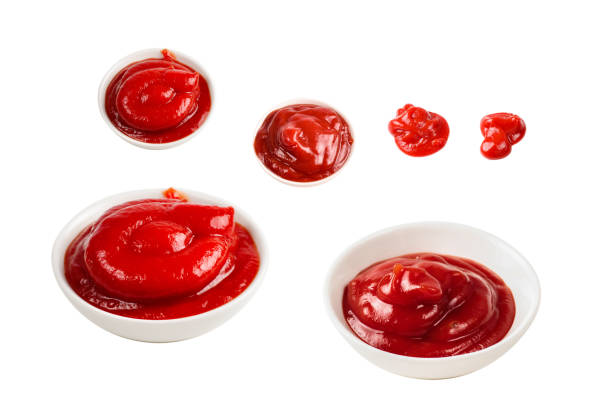 istock Ketchup in white plate on white background. 1661857137