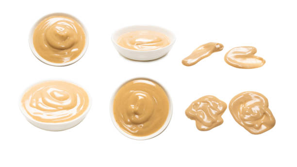 istock Mushroom sauce in a bowl isolated on white background. 1661857156