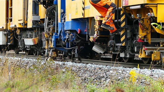 Special train on the track for stabilization of the railway sleepers
