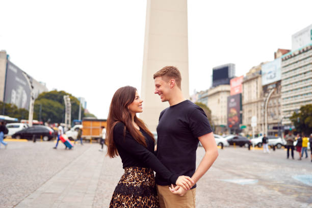 istock portrait happy young heterosexual couple hugging 1661881343