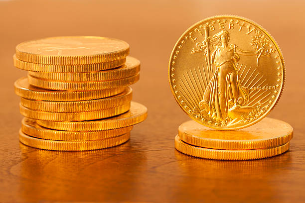 istock American Gold Dollar Coins Stacked 166188449
