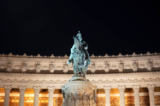 istock Sculptures on Altare della Patria - night 1661885722