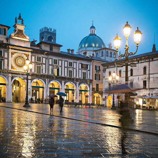 Brescia Rainy night in Brescia - Italy. brescia stock pictures, royalty-free photos & images