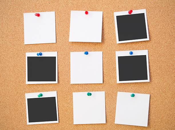 istock Photo and note pinned to cork board 166191332