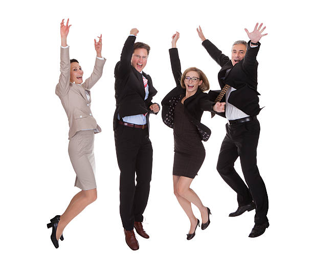 istock Four business partners jumping for joy 166191898