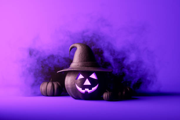 istock Halloween pumpkins on purple background 1661926152