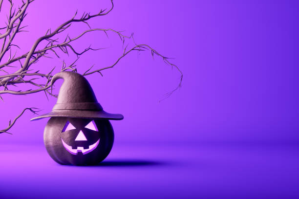 istock Halloween pumpkins on purple background 1661927822