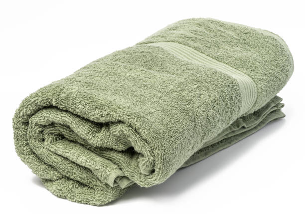 istock Twisted terry green towel on white background 1661979375