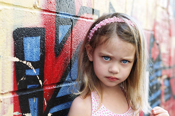 Women painted with spray paint on while graffiti sytle.