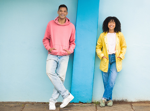 Couple of friends, bonding or portrait on isolated blue background in fashion, afro hair trend or cool style clothes. Smile, happy man or black woman on mock up backdrop, city wall or Brazil mockup