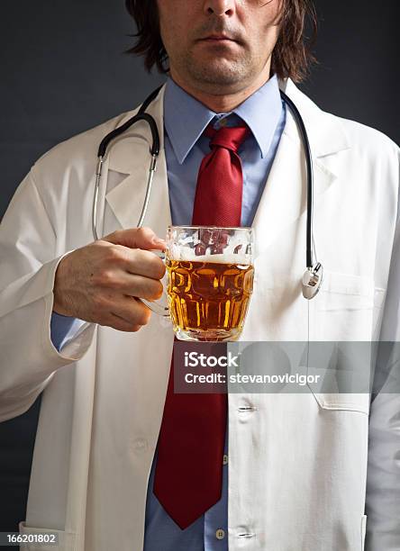 Doctor Is Drinking Beer Stock Photo - Download Image Now - Beer - Alcohol, Doctor, Adult