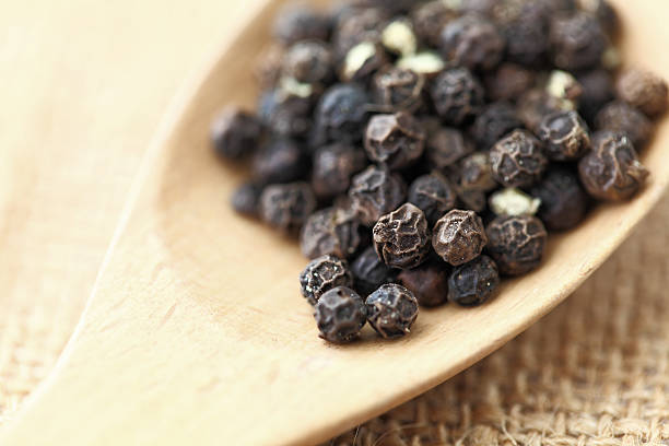 istock pepper in wooden spoon 166203747