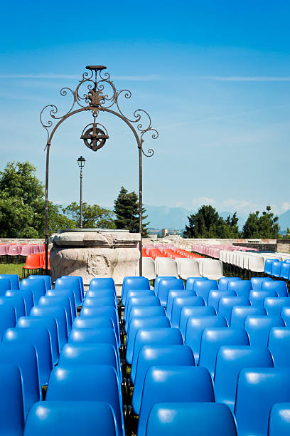 istock Chairs before concert in a park 166203803
