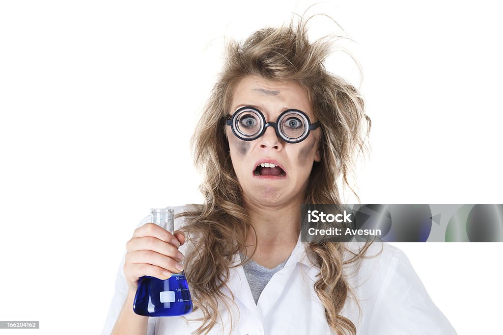 A crazy chemist depicting an accident Crazy chemist woman with disheveled hair and vial in hands Chemist Stock Photo