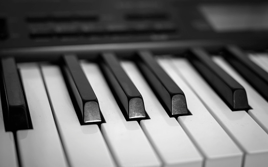 Electric Digital Piano Keyboards close-up with selective soft focus