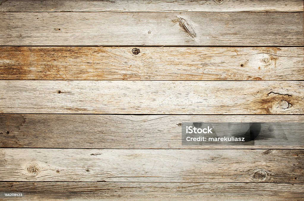 rustic barn wood background rustic weathered barn wood background with knots and nail holes Backgrounds Stock Photo