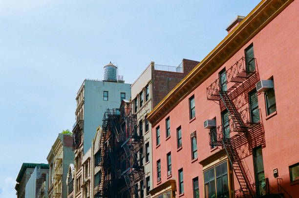 istock Colorful urban buildings with fire escape 1662102108