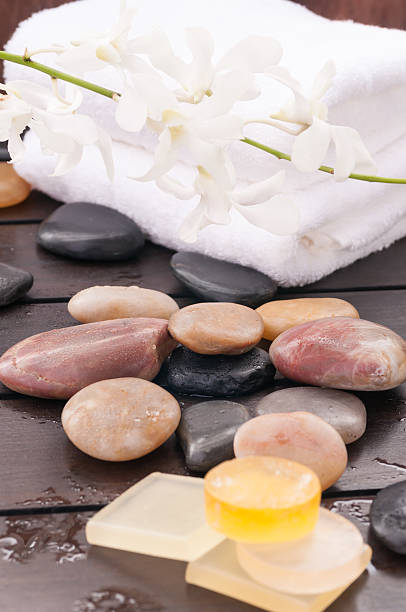 istock Outdoor spa concept with white orchids and zen stones 166210590