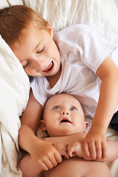 istock Looking up to her big brother 166212029